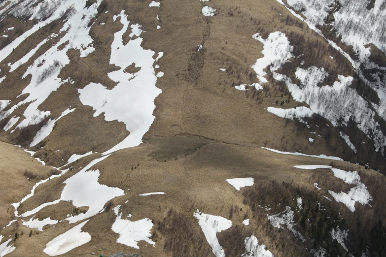 snowy and barren terrain, from above