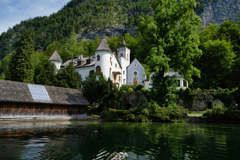 a castle with a mountain in the background