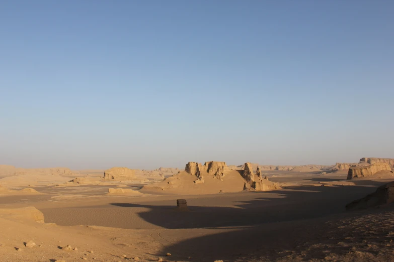 desert area with rocks and hills in the foreground