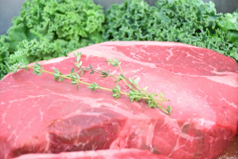 fresh raw lamb chops sit together in the kitchen