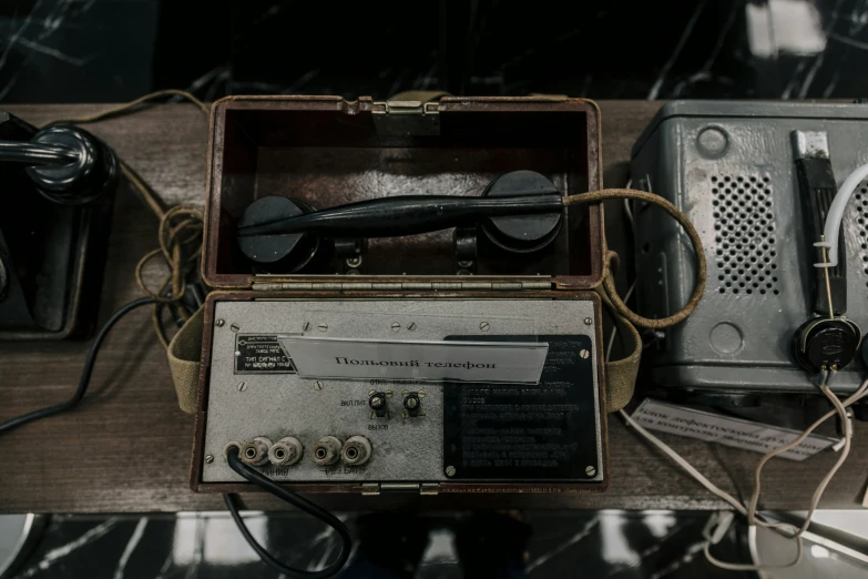 old fashioned antique radio with remote controls and wire