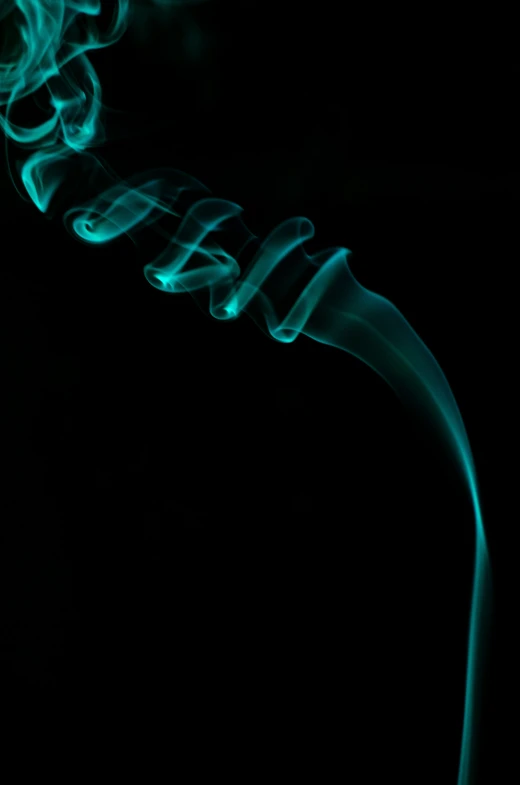 a pograph of smoke pouring from a cigarette