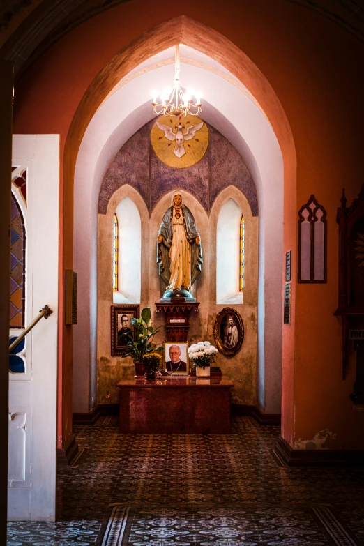 inside a church with an arched entry way