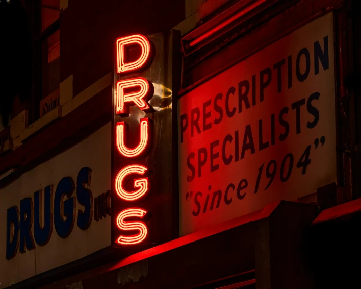 a sign on the wall that reads drug