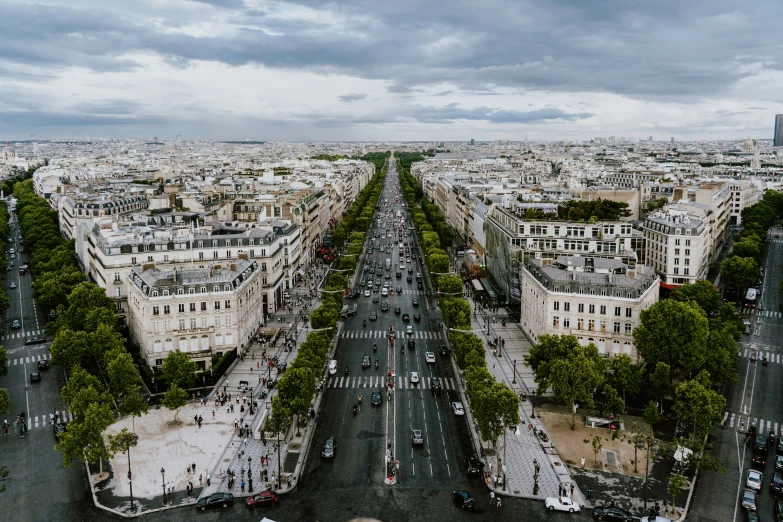 an aerial view of a city street surrounded by buildings