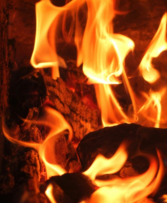 a close up image of  coals or wood