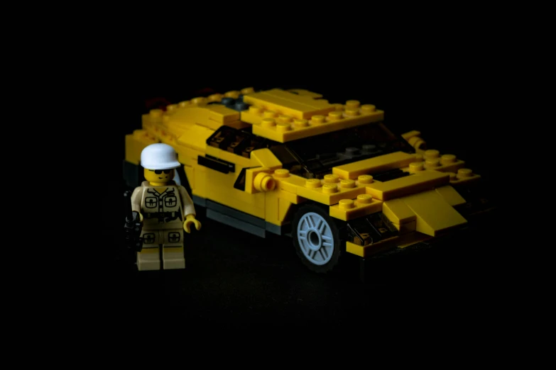 a lego model made to look like a yellow car
