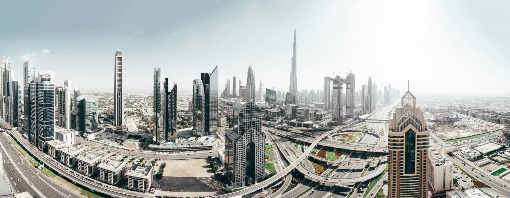 a city skyline with tall buildings in the center