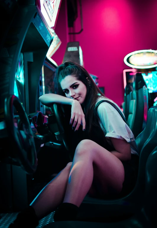 a woman sitting in the front seat of a car