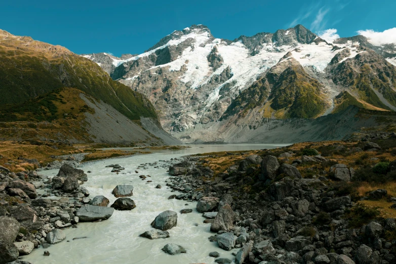 the view from above of some snow covered mountains