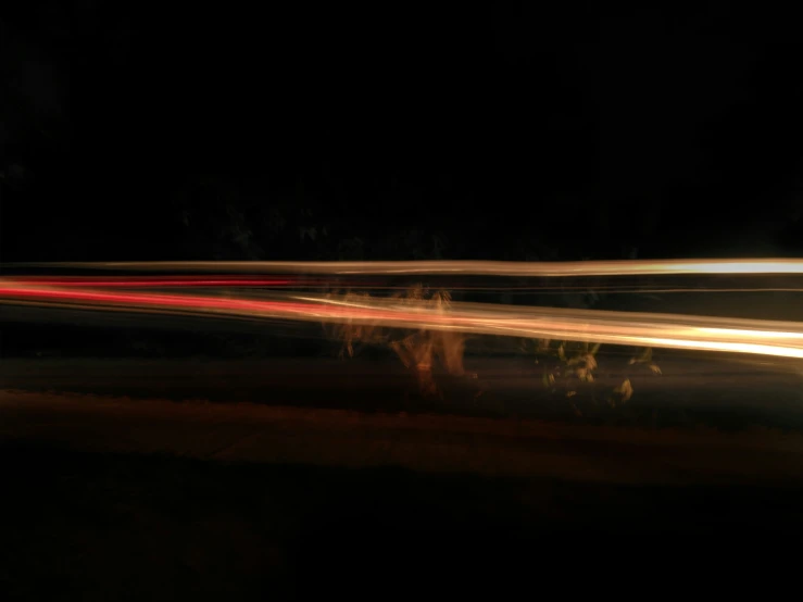 blurred pograph of street lights from an overcast night