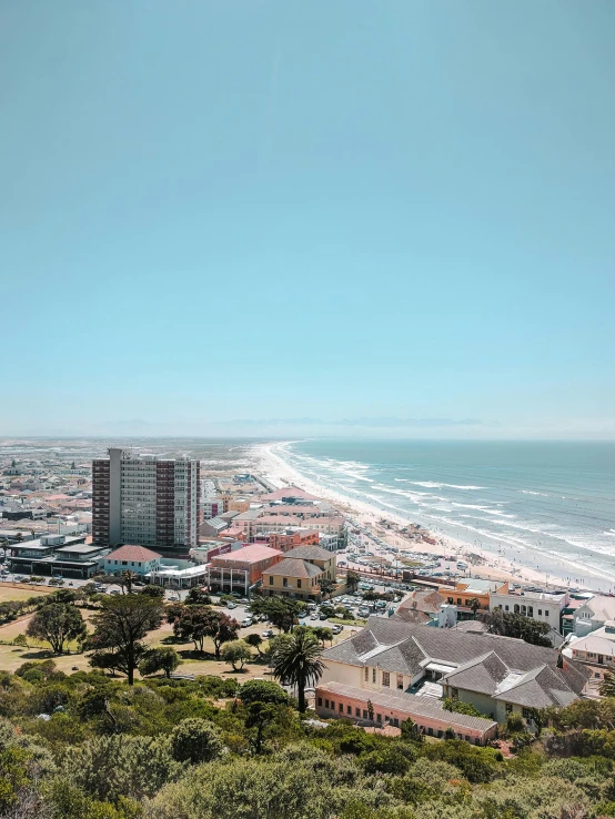 a beach is shown from high above the city