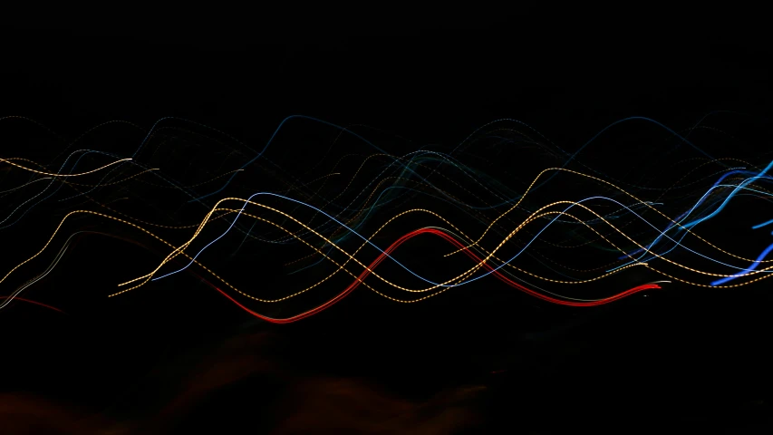 an artistic light painting of long lines against a black background