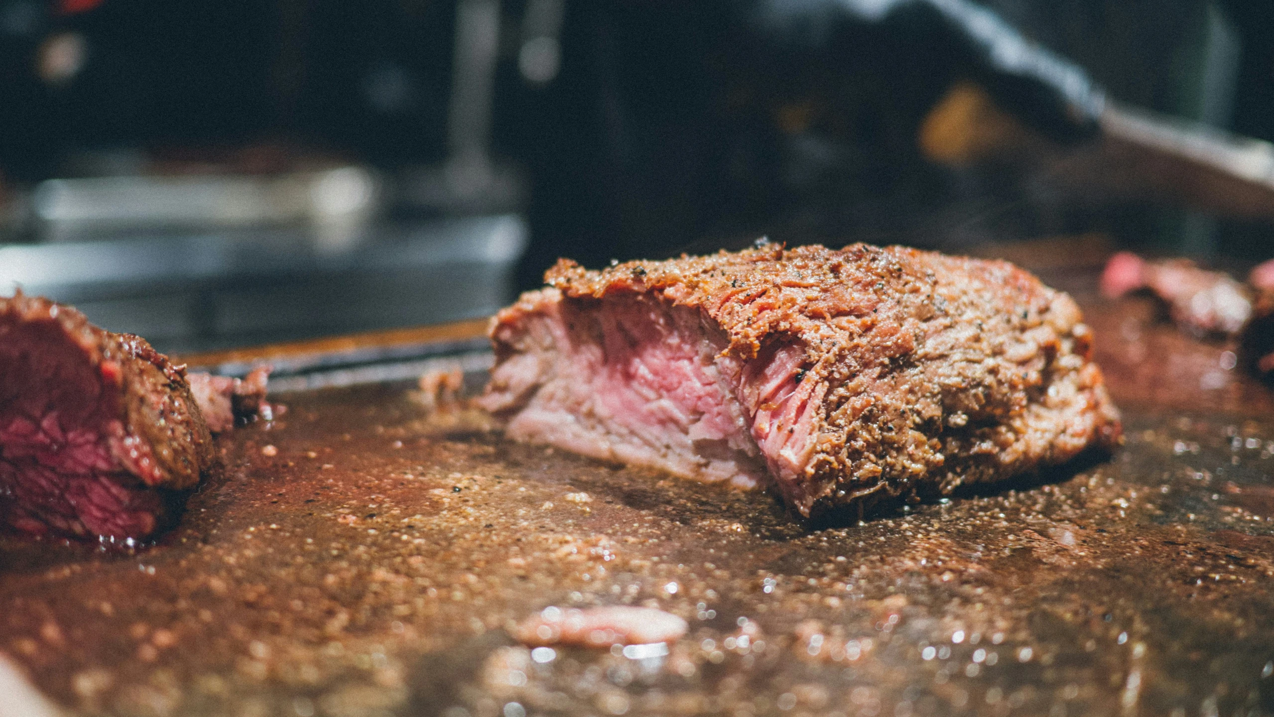 a steak roast on top of a  board