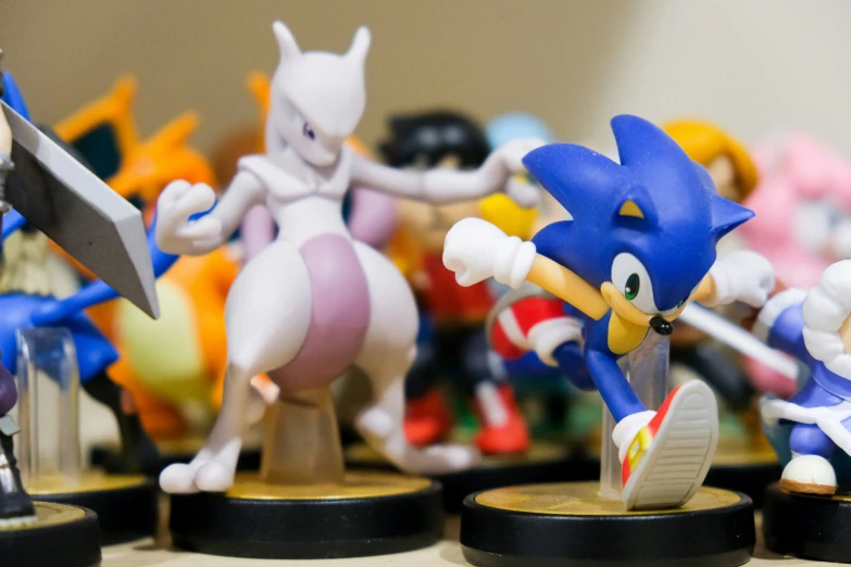 several sonic the hedgehog figures next to each other