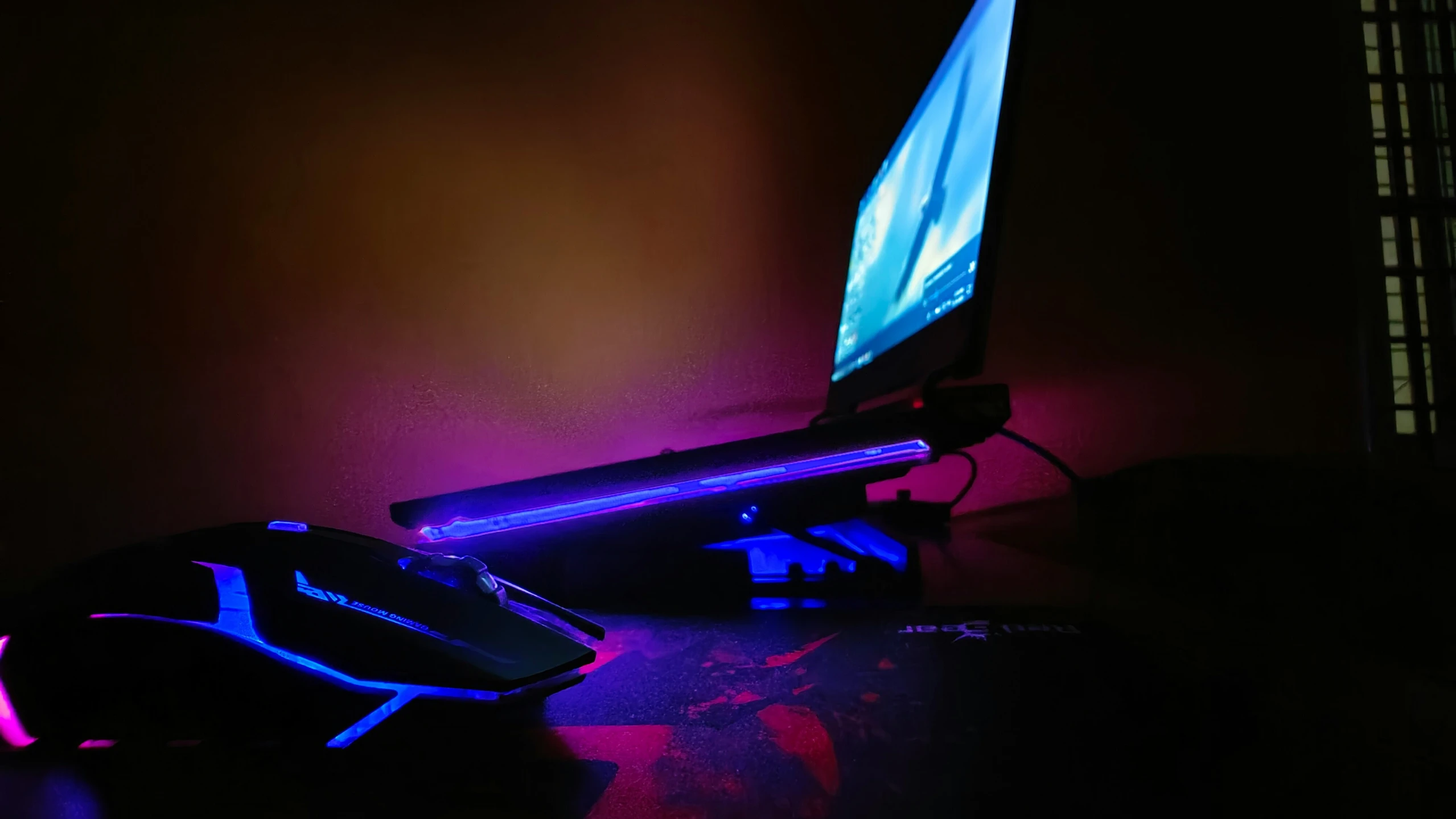 a computer monitor sitting on top of a desk