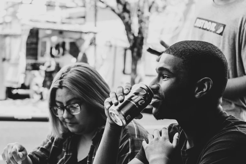 black and white pograph of people drinking coffee