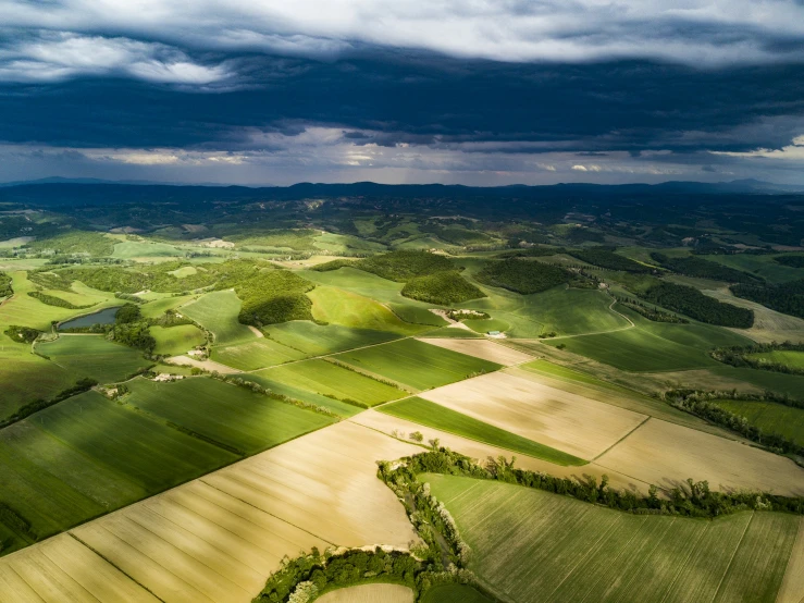 a view from an airplane looking down on some fields