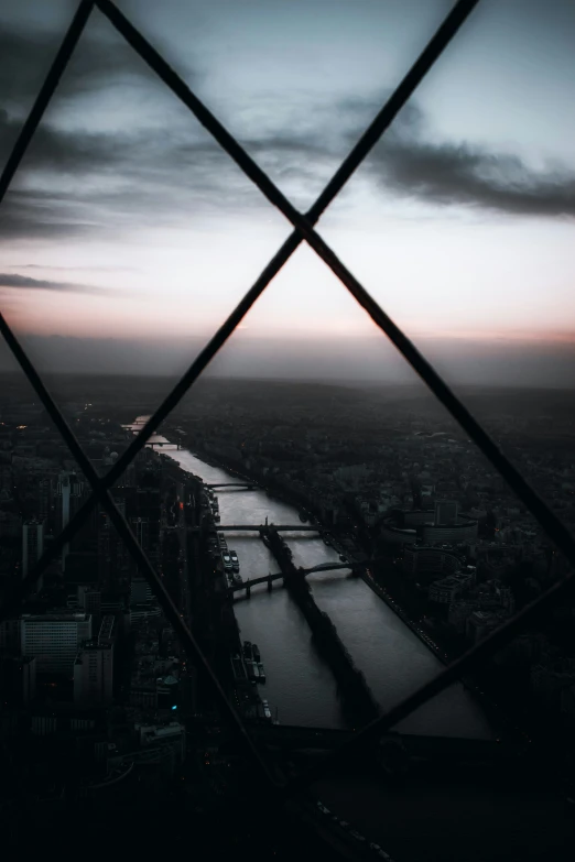 the view from a window looking at a river