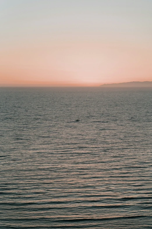 an airplane that is flying over some water