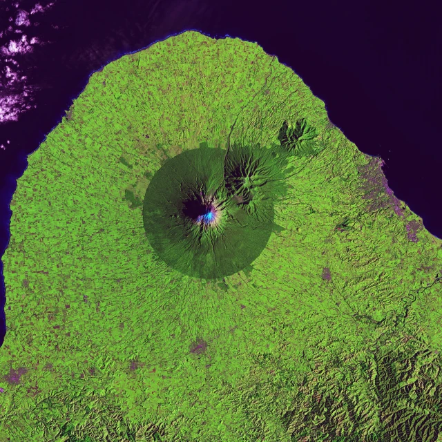 the satellite image shows an island in the middle of a lake