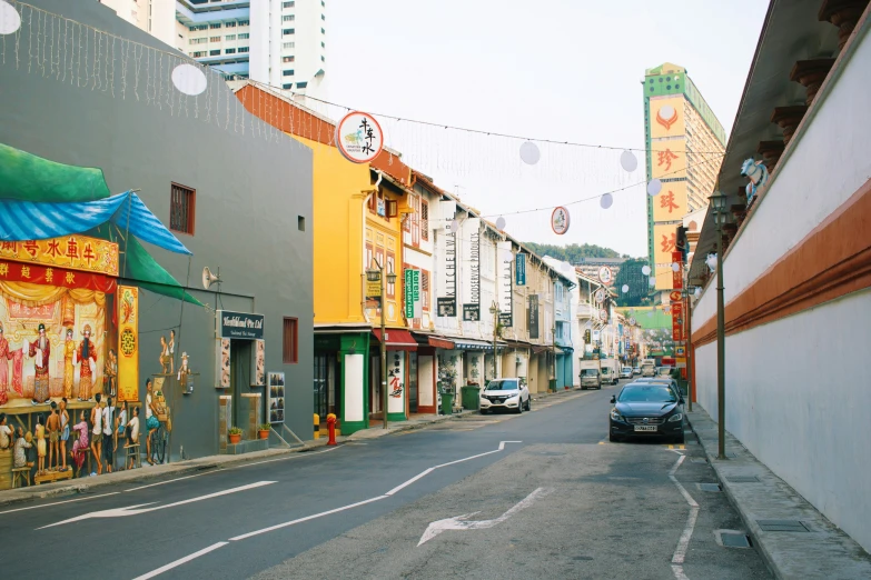 a street with an abundance of buildings on either side