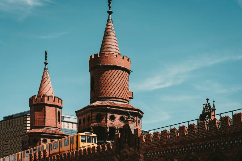 a clock and tower of a brick building