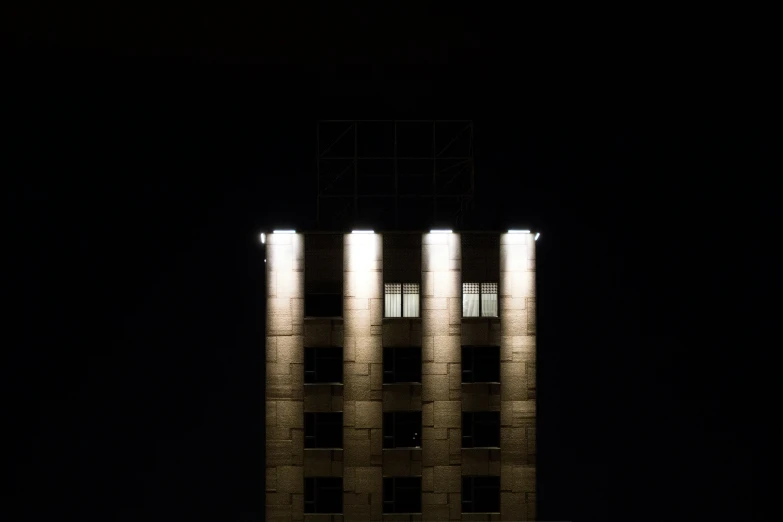 a building has two light pillars on it