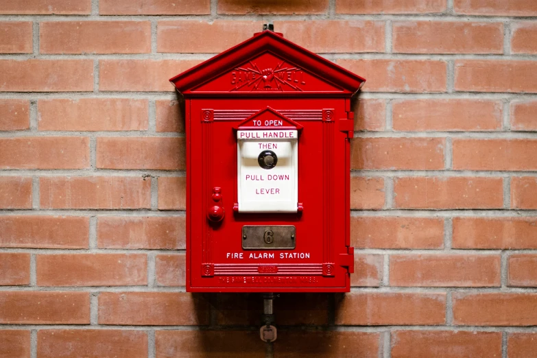 a close up of a post box on a wall