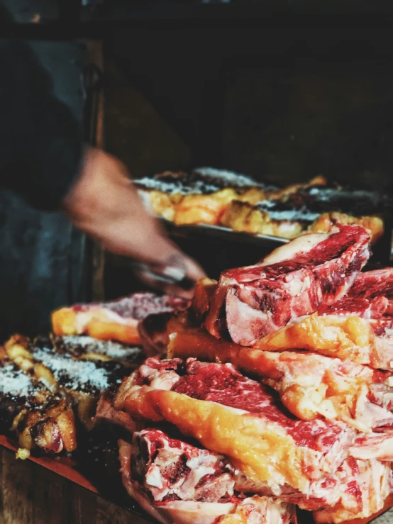 close up of a bunch of pastries on a wooden table