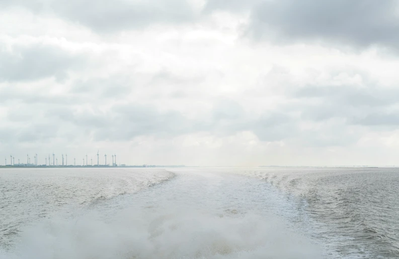 a speed boat making it's way across the water