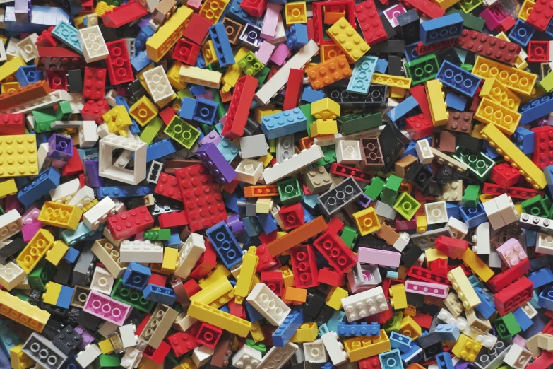 a large pile of many different colored lego bricks