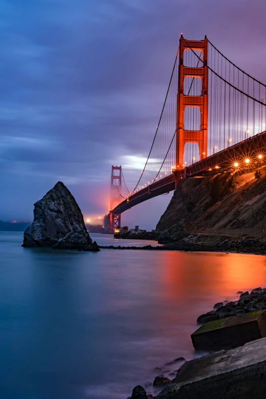 a picture of a very large bridge in the dark