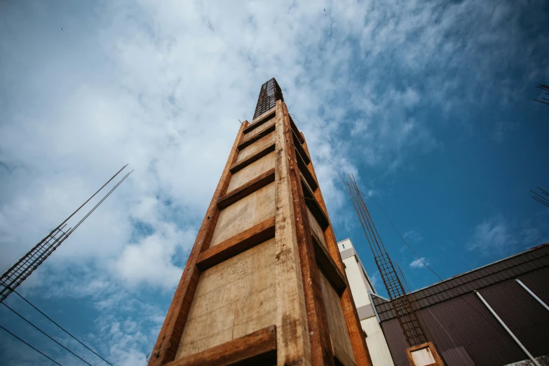 a very tall building with an antenna on top