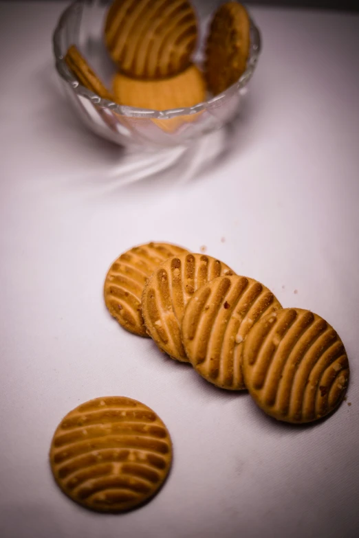 a dessert is shown with three ers and a glass bowl