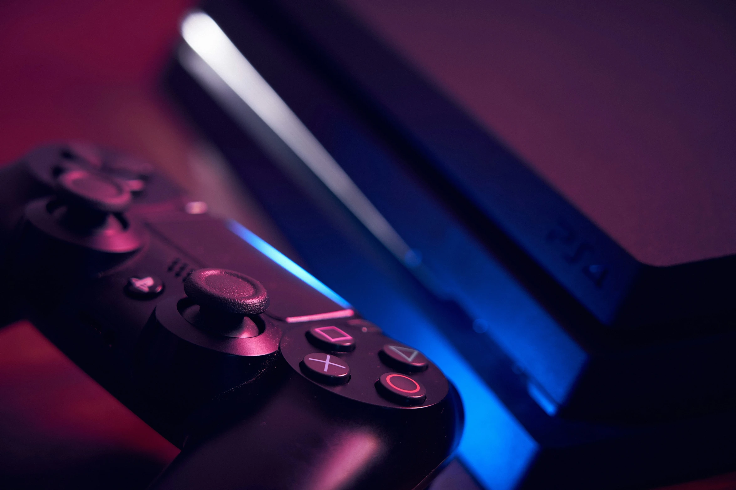 the gamepad of a gaming console is lit up