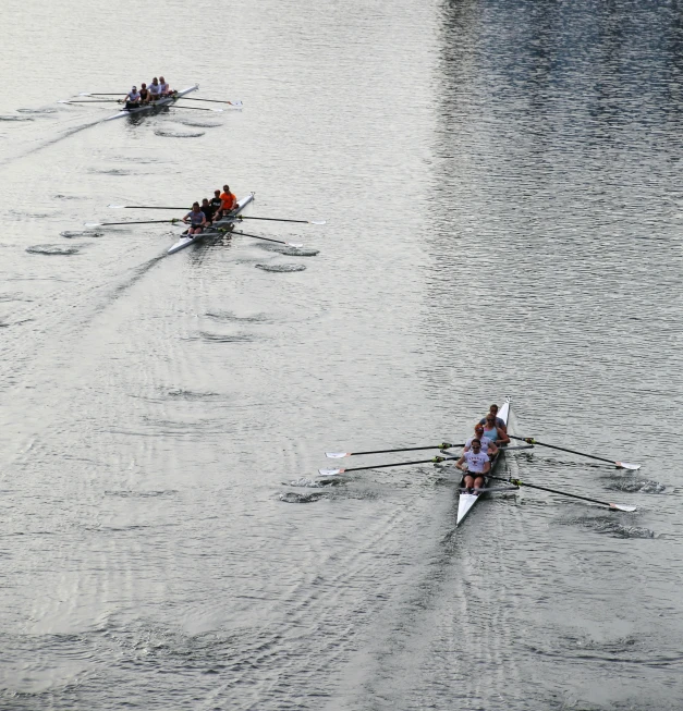 a bunch of people on boat in the water