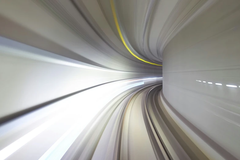 a view of a tunnel with a light moving through it