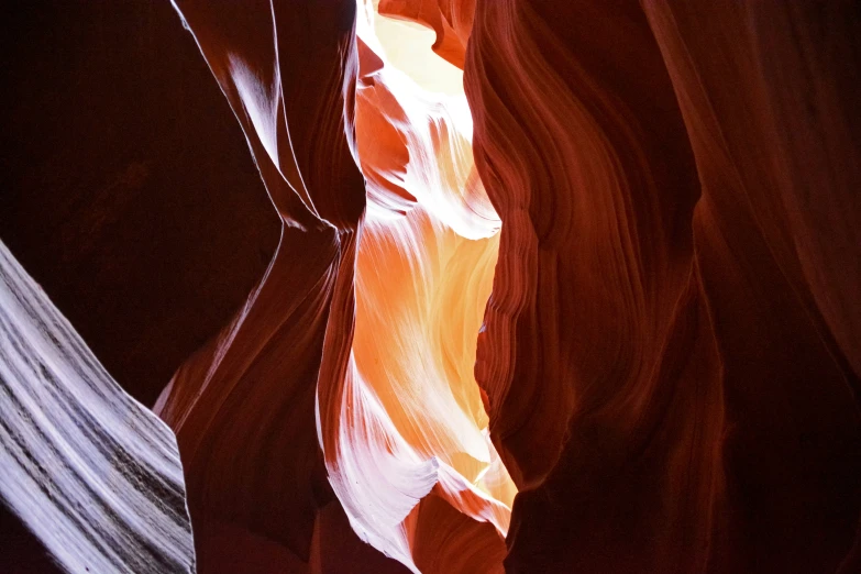 a canyon with light colors on the floor