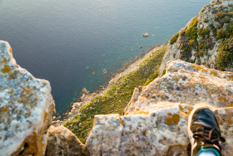 view from top of mountain with shoes hanging out