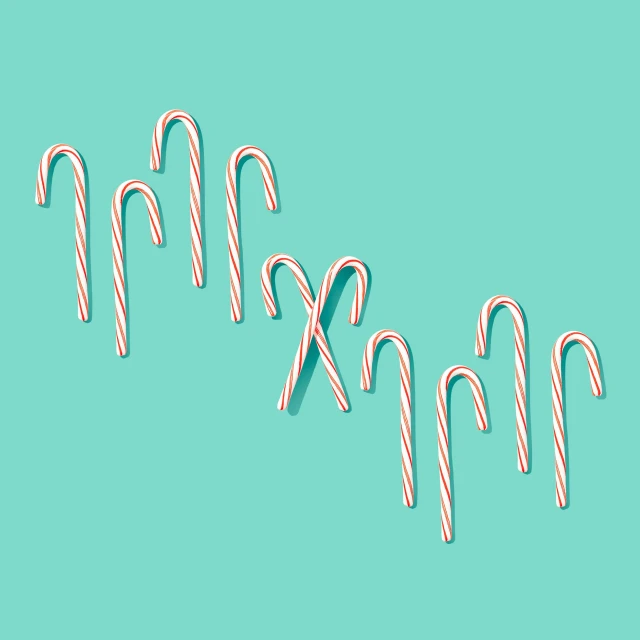 a bunch of candy canes laying on top of each other