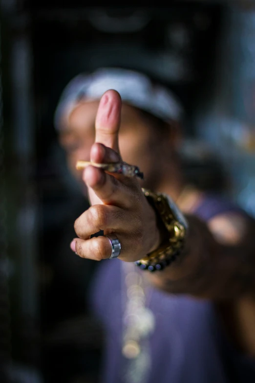 a woman making the middle finger to make an obscene gesture