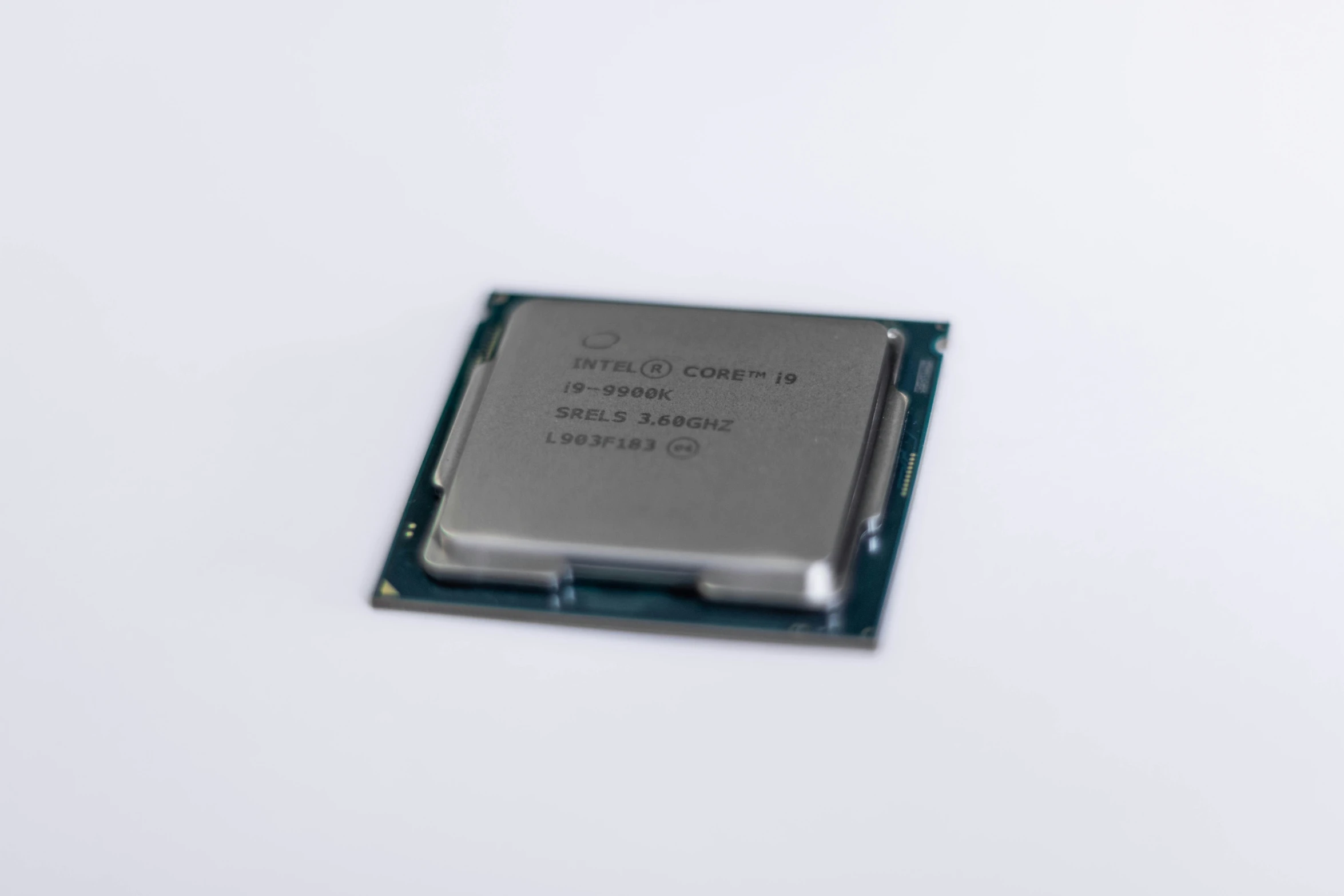 a small chip attached to a cpu on a table