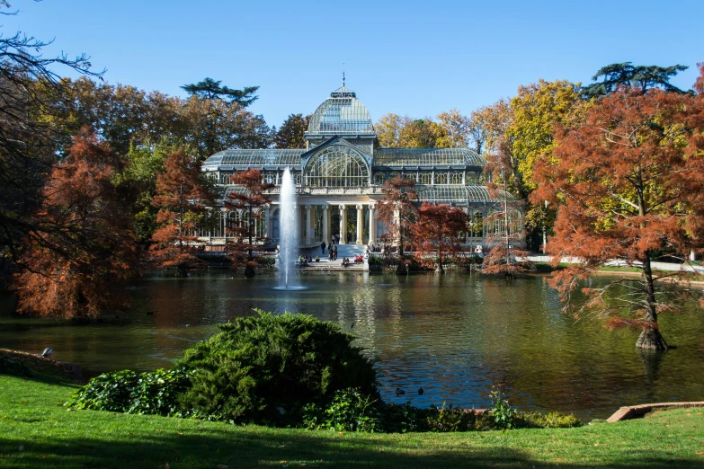 a scenic image of a house with a pool in the foreground