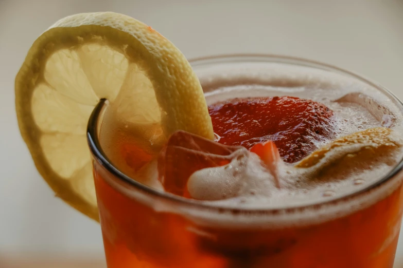 a close up s of a glass with a drink