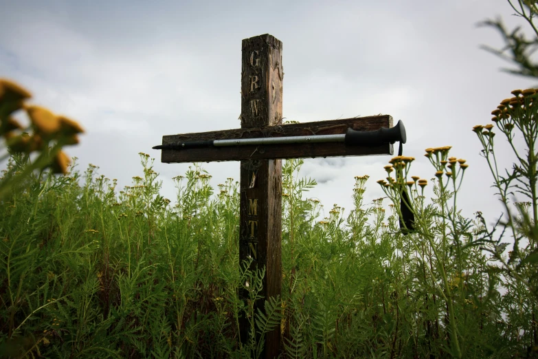 the large wooden sign has a black metal handle