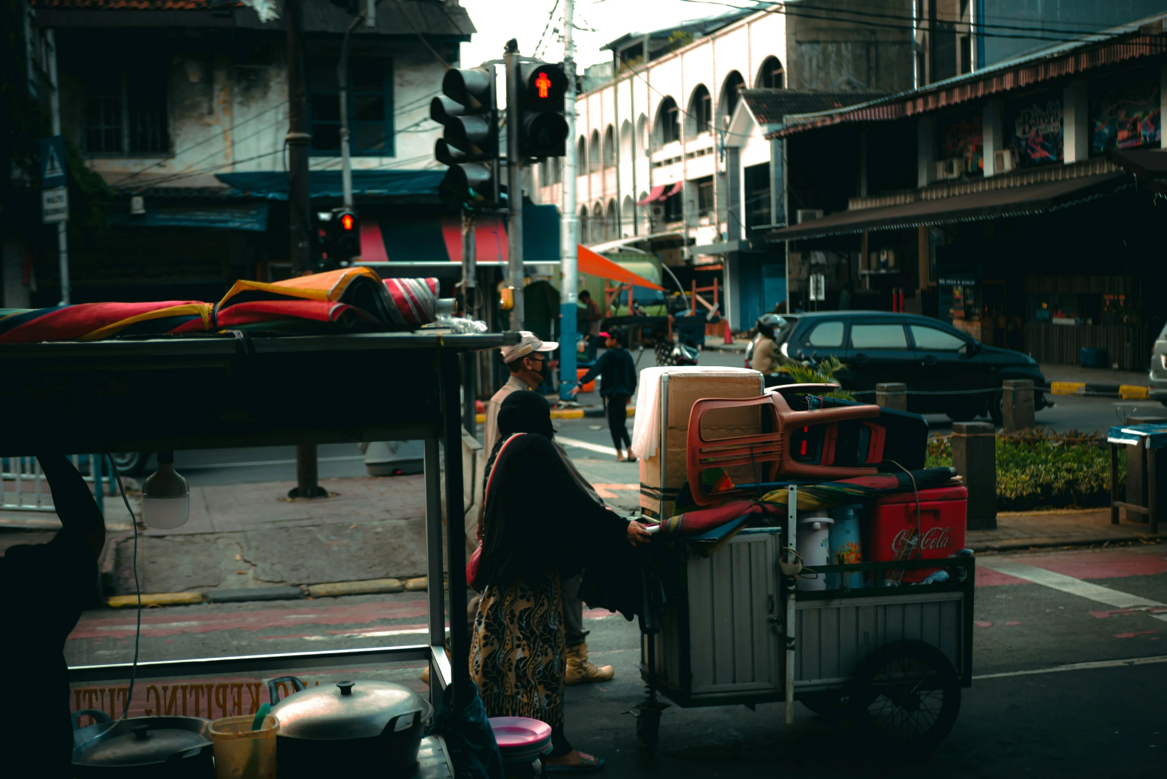 this is a woman in front of an open cart