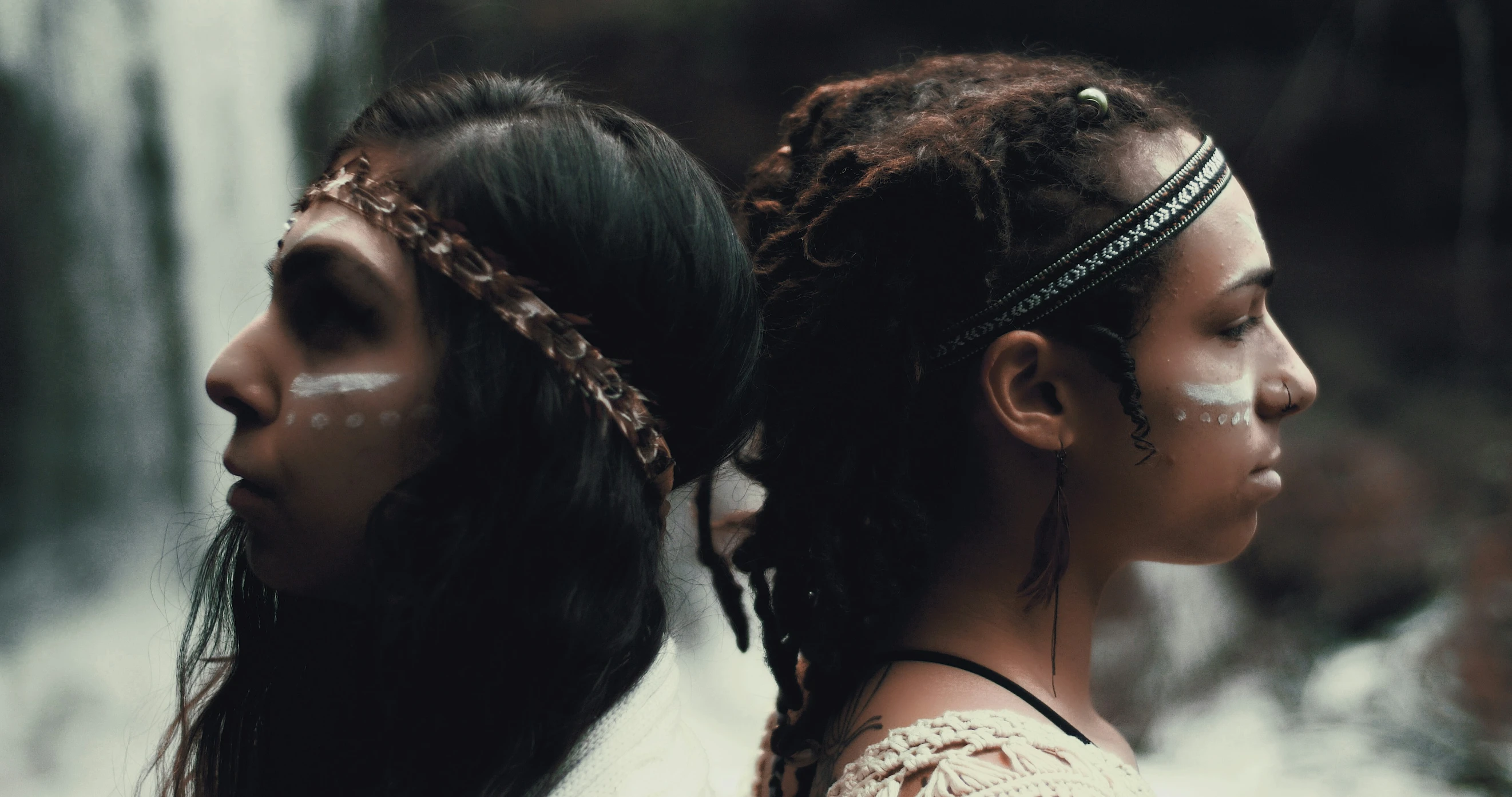 two indian girls with painted on their face