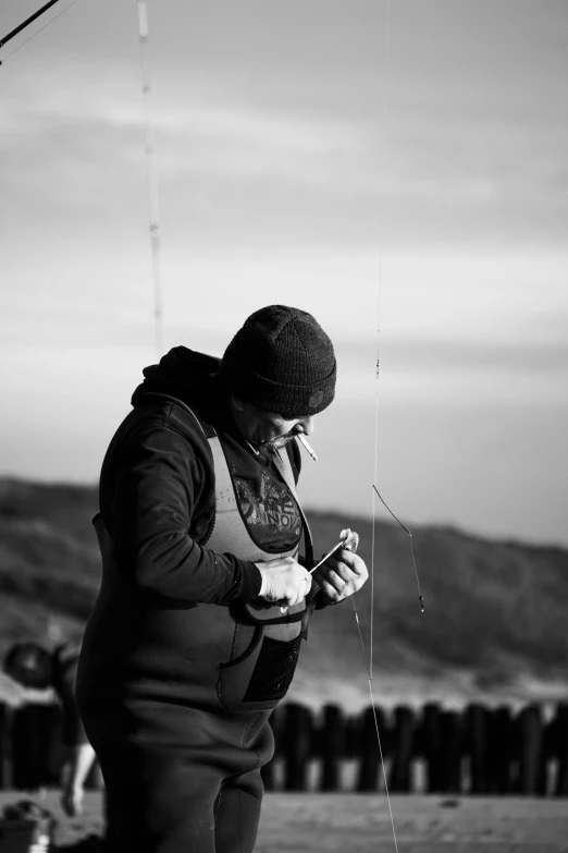 an old woman holds on to her string