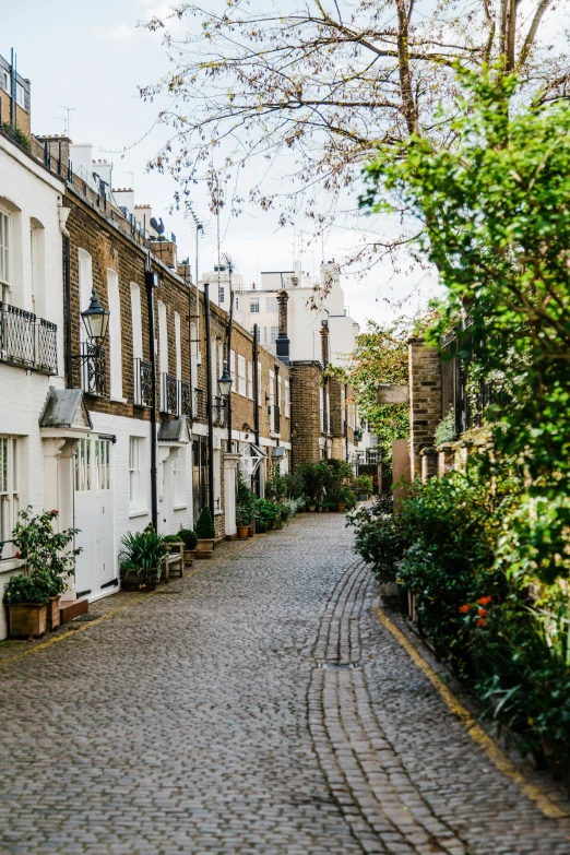 the view down an empty street of buildings